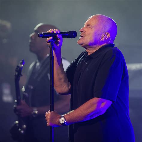 Phil Collins says his drumming days are over, .